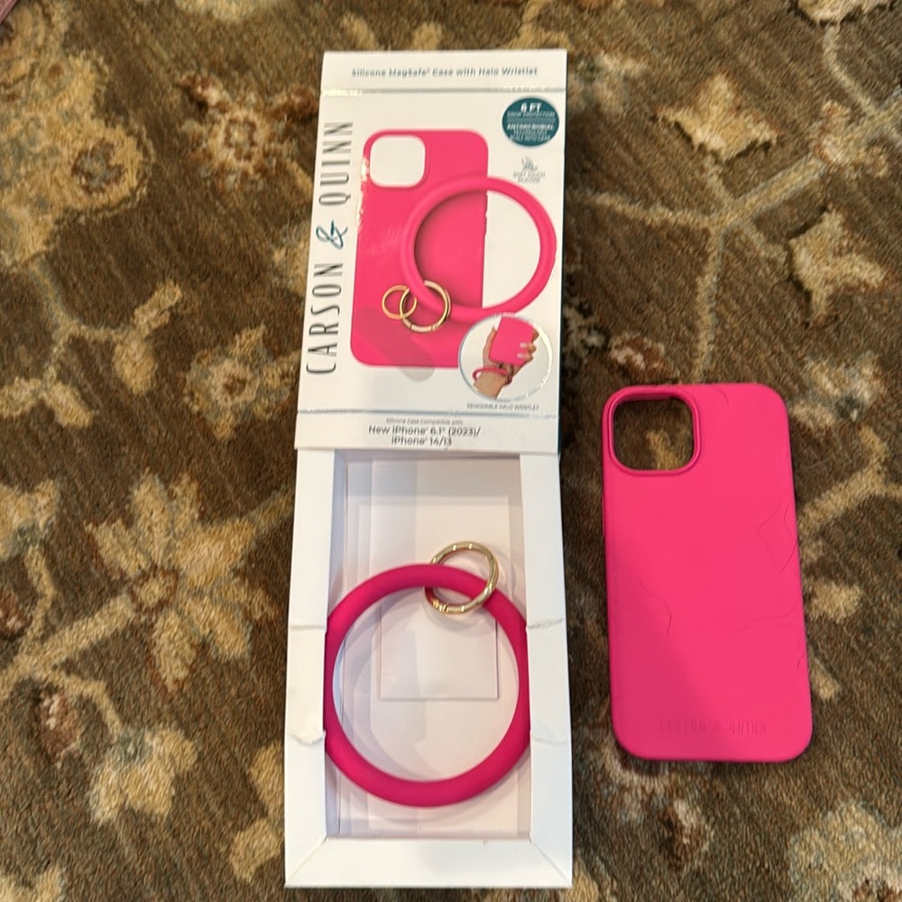 Deep pink iPhone 15 silicone case with key ring